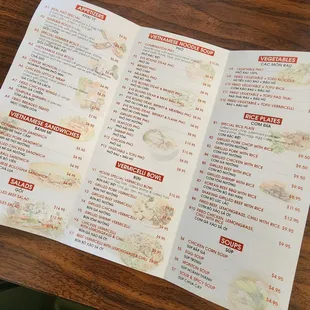 a menu on a wooden table