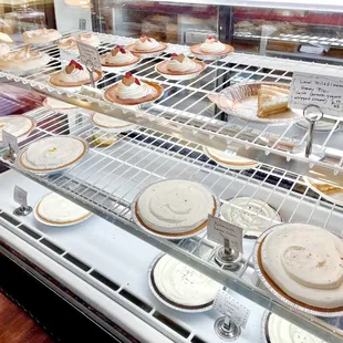 Pies on display: lemon meringue, strawberry cream, wildflower honey, key lime, butterscotch banana cream, coconut cream, chocolate cream