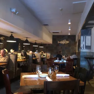 View of the partitioned and cozy dining room near entrance.