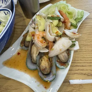 Seafood salad . Good. Spice level 3. Pretty spicy