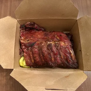 Ribs and brisket (underneath) 2-meat combo.