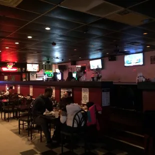 Bar seating and many Tvs with local games