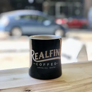 a cup of coffee on a table