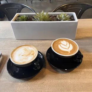 cardamom cappuccino (left), almond latte (right)