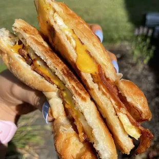 Croissant with bacon, egg, and cheese