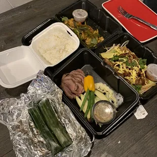 Lemongrass chicken, steak &amp; thuck prahok, student noodles with chicken, and jackfruit sticky rice