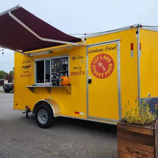 a yellow food truck