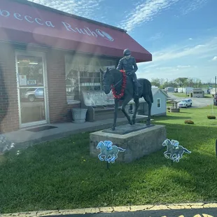 a statue of a man on a horse