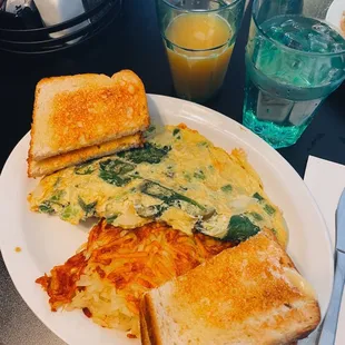 Built my own omelette: Pepper Jack, Spinach, Bell pepper, Onion, &amp; Jalapeño with sourdough bread and crispy hash browns.