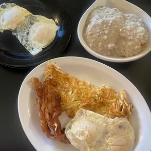 two plates of breakfast food