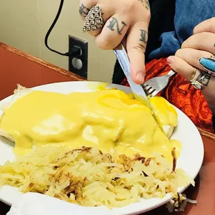 a plate of food with a knife and fork