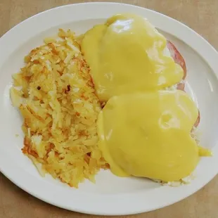 Eggs Benedict with your choice of ham or sausage