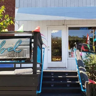 the entrance to a coffee shop