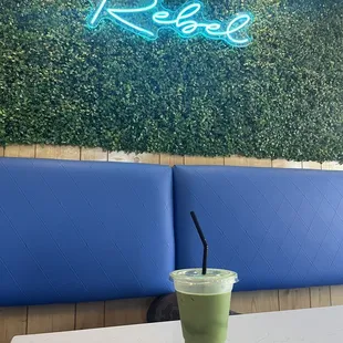 a green smoothie on a table