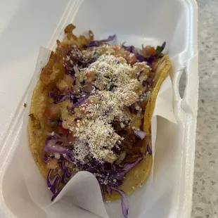 shrimp taco. not understanding the cabbage lol