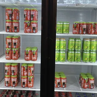 a refrigerator full of sodas