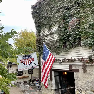 the outside of a building with an american flag
