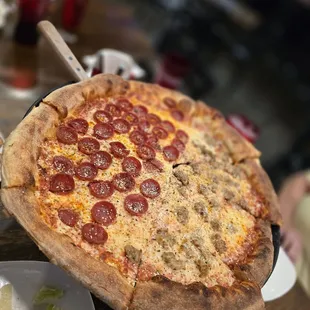 Half pepperoni half sausage