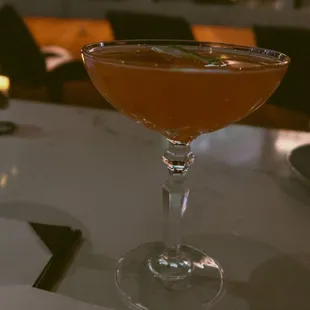 a cocktail in a coupe glass