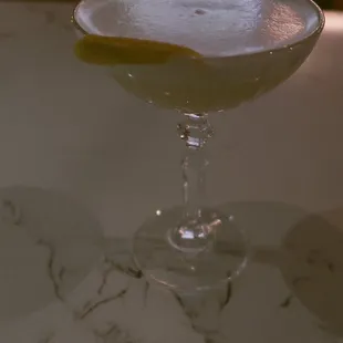 a cocktail in a coupe glass