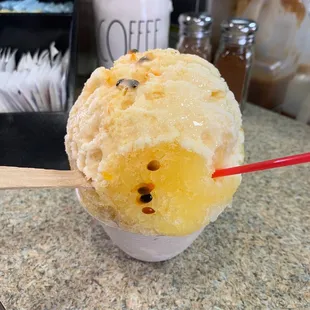 Lilikoi, mango and pineapple with a condensed milk drizzle. Yum.