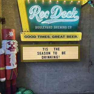 a neon sign for a beer company
