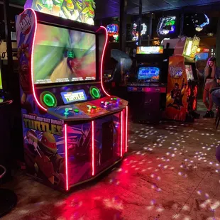 a video game machine in the middle of the room