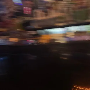 a blurry image of a city street at night