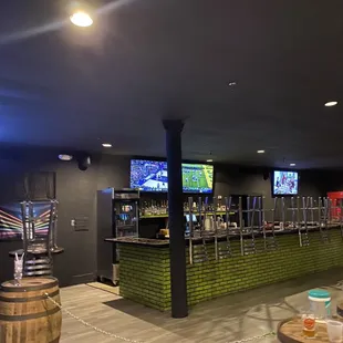 a bar with a television in the background
