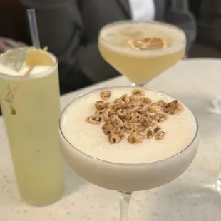 two cocktails on a table