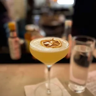 a cocktail in a coupe glass