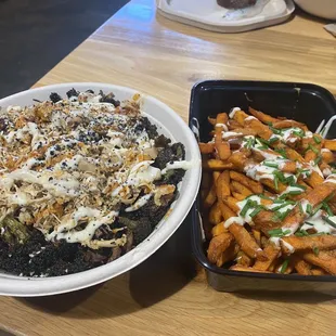 Roasted Brussels and Broccoli topped with Chicken and a side of Loaded Sweet Potato Fries!! Yum