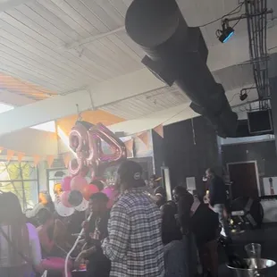 a group of people sitting in a lounge area