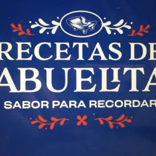 a blue sign with the words recetas de abuelita