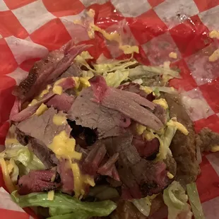 a steak and lettuce sandwich