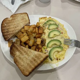 San Diego omlette, Diced chicken breast, Pico de gallo, pepper jack cheese and Avocado. Yum...