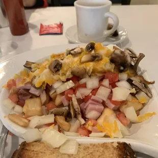 Straggler skillet with multigrain toast.