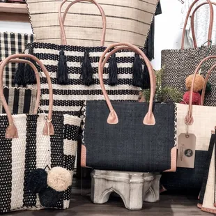 These are not just your average straw handbags. These are all handmade in Madagascar &amp; Guatemala.