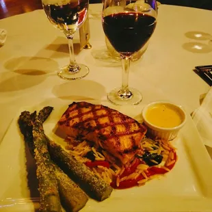 Deliciously Prepared  Grilled Salmon (8 oz), Rice and Asparagus with/a Glass of Nice Red Wine ...