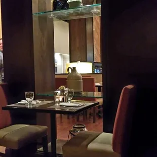 a table and chairs in a restaurant