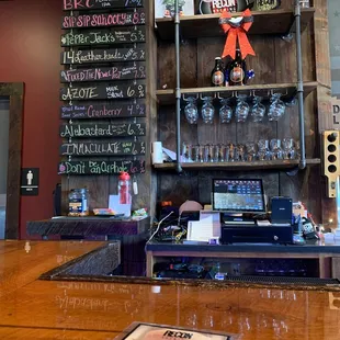 a bar with a wooden bar top