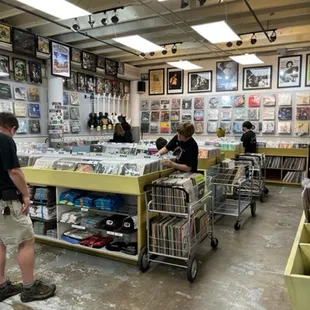 Inside view of some of the bins in the store with some of the discount bins parked on the ends.