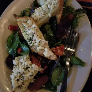 Waiting for a band. Nice place and the Korean ribs and goat cheese crostini is delicious!