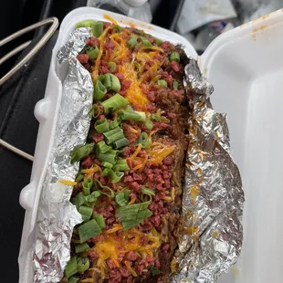 The works baked potato with brisket it will be one of the best barbecue baked potatoes you've ever had!
