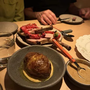 Side of potato, pork chop with guava sauce and jimmy nardellos