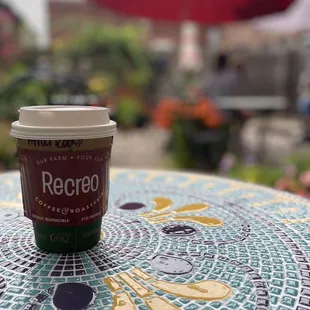 a coffee cup on a table