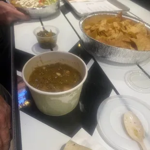 Green chili stew with chips and green chili salsa