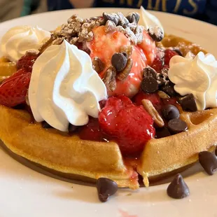Kids will love this: Waffle (Very tasty on its own) with vanilla ice cream, strawberries, chocolate chips,whip cream, side of sausage too