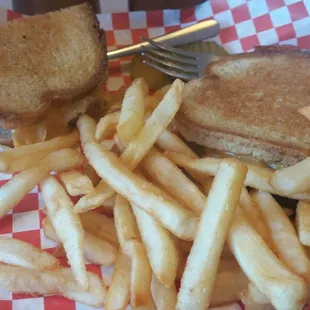 Patty melt with fries.
