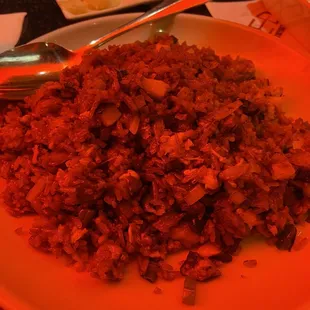 a plate of rice and vegetables